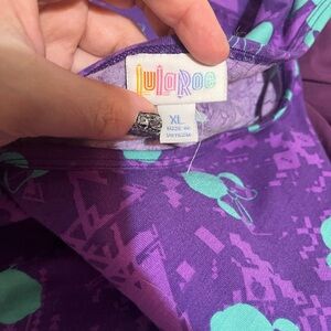 LuLaRoe Purple and Teal Graphic Disney top